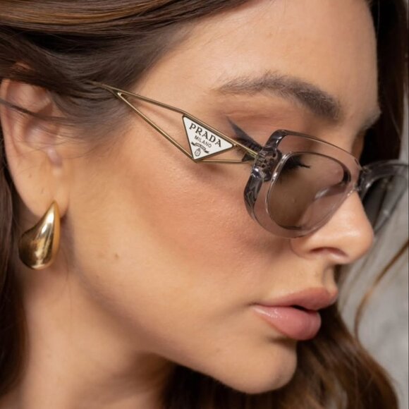 🕶️ New Prada PR14YS 12R50K Sunglasses - Transparent Grey Frame, Grey  Lenses - Picture 1 of 12